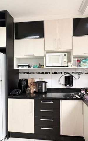 Casa à venda com 150m², 3 quartos e 2 vagas Casa à venda com 150m², 3 quartos e 2 vagasCozinha