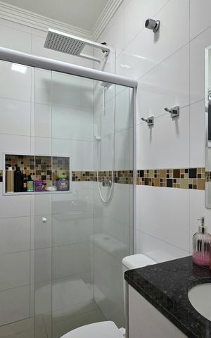 Casa à venda com 128m², 2 quartos e 2 vagas Casa à venda com 128m², 2 quartos e 2 vagasBanheiro da Suíte 1