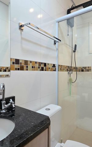 Casa à venda com 128m², 2 quartos e 2 vagas Casa à venda com 128m², 2 quartos e 2 vagasBanheiro da Suíte 2