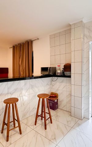 Casa à venda com 45m², 3 quartos e 2 vagas Casa à venda com 45m², 3 quartos e 2 vagasCozinha