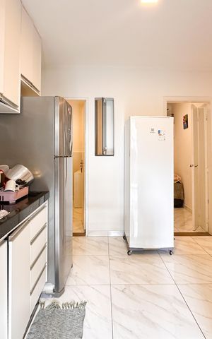 Casa à venda com 45m², 3 quartos e 2 vagas Casa à venda com 45m², 3 quartos e 2 vagasCozinha