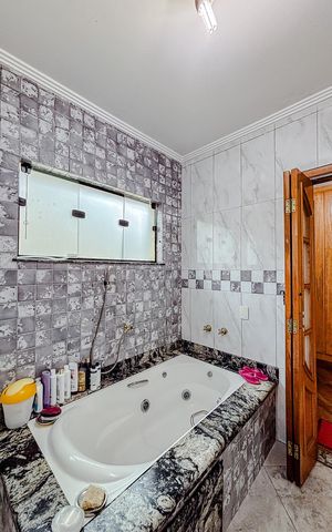 Casa para alugar com 379m², 5 quartos e 7 vagasBanheiro da Suíte 4