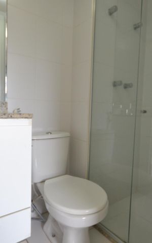 Apartamento para alugar com 70m², 2 quartos e 2 vagasBanheiro do Quarto 1 - Suíte
