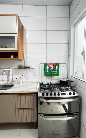 Casa à venda com 58m², 2 quartos e sem vaga Casa à venda com 58m², 2 quartos e sem vagaCozinha