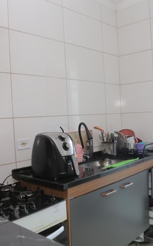 Casa de condomínio à venda com 42m², 2 quartos e sem vaga Casa de condomínio à venda com 42m², 2 quartos e sem vagaCozinha