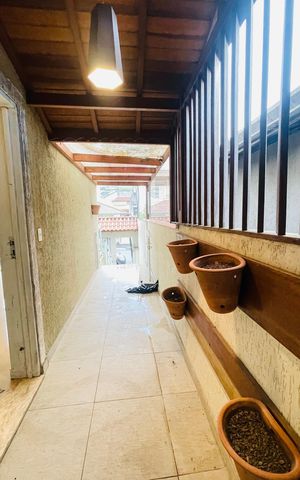 Casa de condomínio para alugar com 260m², 3 quartos e 3 vagasCorredor de acesso a casa