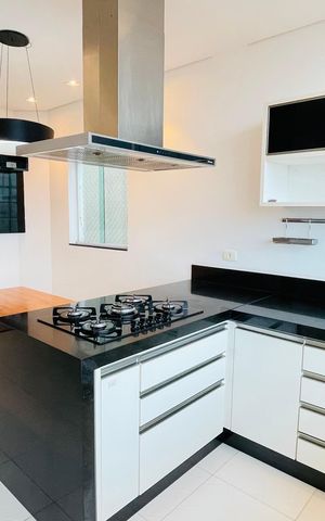Casa de condomínio para alugar com 260m², 3 quartos e 3 vagasCozinha