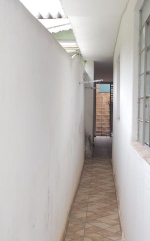 Casa à venda com 150m², 3 quartos e 2 vagas Casa à venda com 150m², 3 quartos e 2 vagasCorredor do quintal