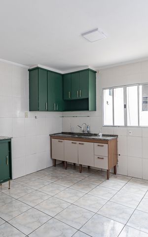 Casa para alugar com 90m², 2 quartos e 2 vagasCozinha