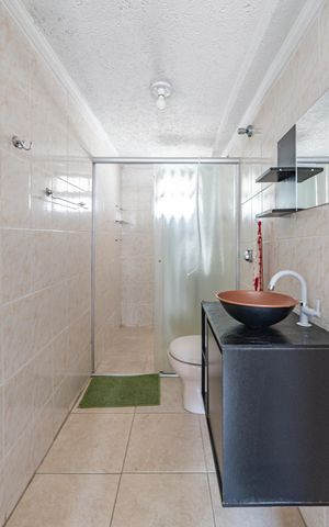 Casa para alugar com 90m², 2 quartos e 2 vagasBanheiro