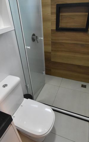 Casa de condomínio à venda com 89m², 3 quartos e 2 vagasBanheiro da Suíte