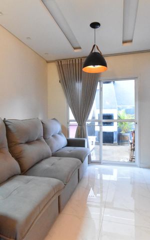 Casa de condomínio à venda com 89m², 3 quartos e 2 vagasSala