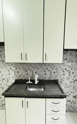 Apartamento à venda com 49m², 2 quartos e 1 vaga Apartamento à venda com 49m², 2 quartos e 1 vagaCozinha e Área de Serviço