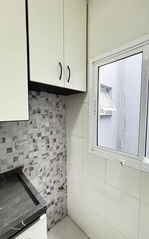Apartamento à venda com 49m², 2 quartos e 1 vaga Apartamento à venda com 49m², 2 quartos e 1 vagaCozinha e Área de Serviço
