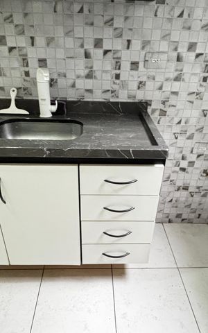 Apartamento à venda com 49m², 2 quartos e 1 vaga Apartamento à venda com 49m², 2 quartos e 1 vagaCozinha e Área de Serviço