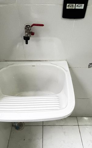 Apartamento à venda com 49m², 2 quartos e 1 vaga Apartamento à venda com 49m², 2 quartos e 1 vagaCozinha e Área de Serviço
