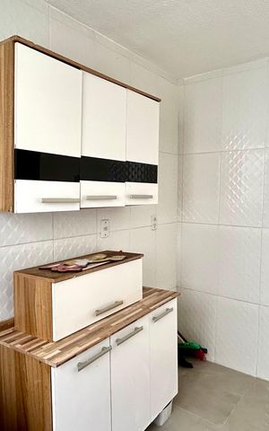 Apartamento à venda com 47m², 2 quartos e 1 vaga Apartamento à venda com 47m², 2 quartos e 1 vagaCozinha e Área de Serviço