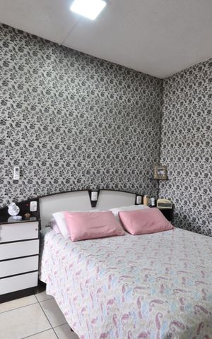 Casa à venda com 150m², 4 quartos e 2 vagasSuíte 1