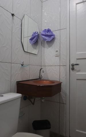 Casa para alugar com 80m², 2 quartos e 1 vagaBanheiro de Baixo