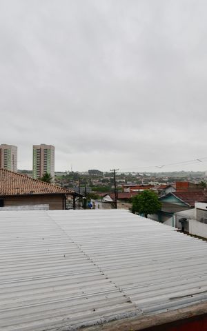 Casa à venda com 110m², 3 quartos e 2 vagasQuarto 1 - Vista