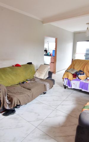 Casa à venda com 110m², 3 quartos e 2 vagasSala