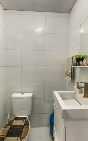Casa à venda com 73m², 2 quartos e 1 vaga Casa à venda com 73m², 2 quartos e 1 vagaBanheiro de serviço