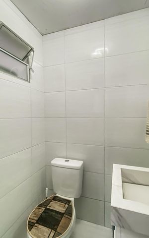 Casa à venda com 73m², 2 quartos e 1 vaga Casa à venda com 73m², 2 quartos e 1 vagaBanheiro de serviço