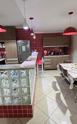 Casa à venda com 216m², 2 quartos e 2 vagasCozinha
