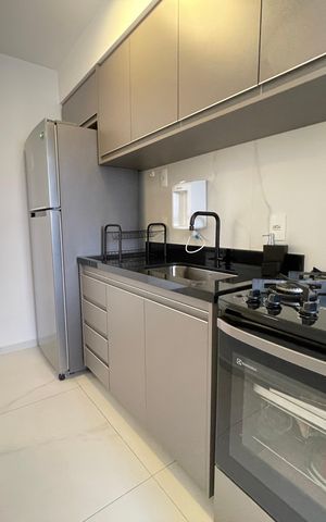 Apartamento à venda com 65m², 2 quartos e 1 vaga Apartamento à venda com 65m², 2 quartos e 1 vagaCozinha e Área de Serviço