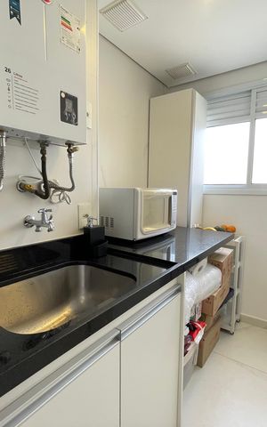 Apartamento à venda com 65m², 2 quartos e 1 vaga Apartamento à venda com 65m², 2 quartos e 1 vagaCozinha e Área de Serviço