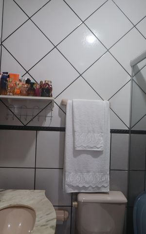 Casa à venda com 600m², 5 quartos e 10 vagasBanheiro 1 Casa 2