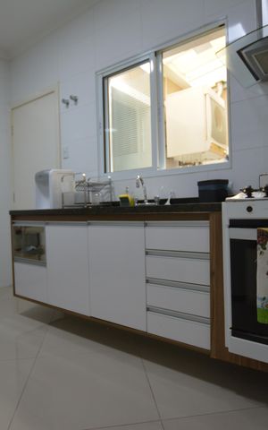Casa para alugar com 75m², 2 quartos e 2 vagasCOZINHA