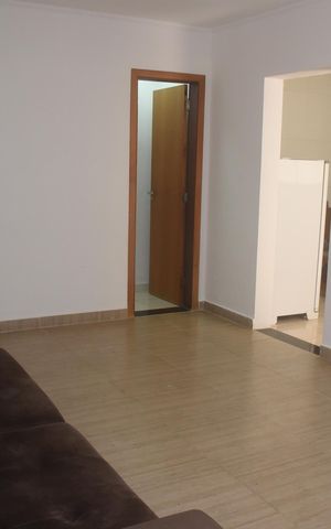 Casa de condomínio para alugar com 80m², 2 quartos e 2 vagasSala
