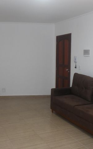 Casa de condomínio para alugar com 80m², 2 quartos e 2 vagasSala