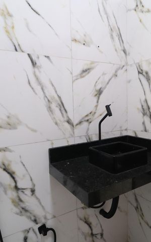 Casa para alugar com 70m², 2 quartos e 2 vagasBanheiro Social