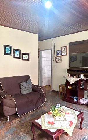 Casa à venda com 250m², 2 quartos e 2 vagas Casa à venda com 250m², 2 quartos e 2 vagasSala