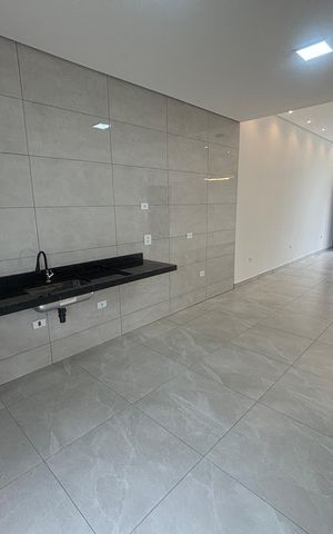 Casa à venda com 102m², 3 quartos e 2 vagas Casa à venda com 102m², 3 quartos e 2 vagasCozinha