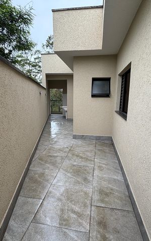 Casa à venda com 102m², 3 quartos e 2 vagas Casa à venda com 102m², 3 quartos e 2 vagasQuintal