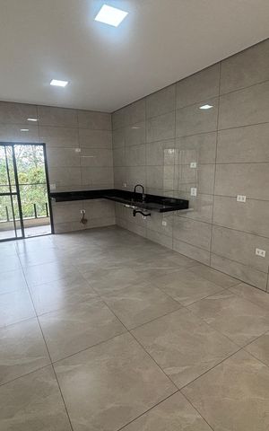Casa à venda com 102m², 3 quartos e 2 vagas Casa à venda com 102m², 3 quartos e 2 vagasCozinha