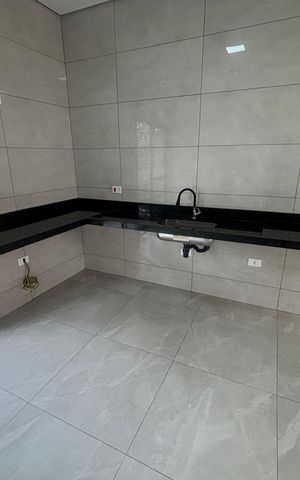 Casa à venda com 102m², 3 quartos e 2 vagas Casa à venda com 102m², 3 quartos e 2 vagasCozinha
