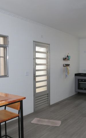 Casa à venda com 159m², 3 quartos e 2 vagas Casa à venda com 159m², 3 quartos e 2 vagasCozinha