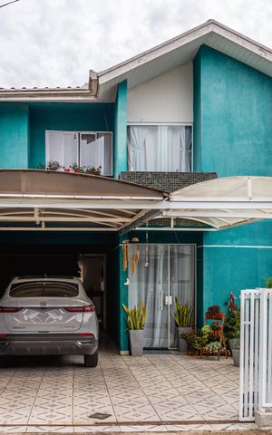 Casa à venda com 106m², 3 quartos e 1 vaga Casa à venda com 106m², 3 quartos e 1 vagaFachada