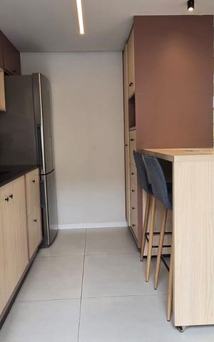 Casa de condomínio à venda com 98m², 3 quartos e 2 vagas Casa de condomínio à venda com 98m², 3 quartos e 2 vagasCozinha e Área de Serviço