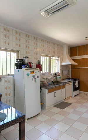Casa para alugar com 416m², 4 quartos e 4 vagasCOZINHA