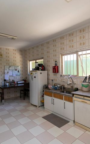 Casa para alugar com 416m², 4 quartos e 4 vagasCOZINHA