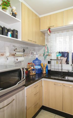 Casa de condomínio à venda com 67m², 2 quartos e 1 vaga Casa de condomínio à venda com 67m², 2 quartos e 1 vagaCozinha