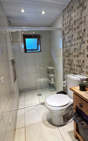 Casa de condomínio para alugar com 225m², 3 quartos e 2 vagasBanheiro