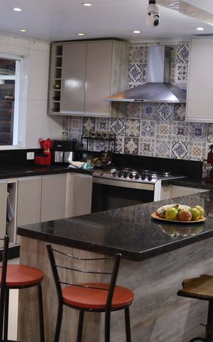 Casa de condomínio para alugar com 225m², 3 quartos e 2 vagasCozinha