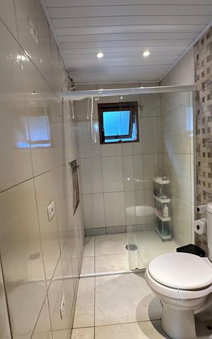 Casa de condomínio para alugar com 225m², 3 quartos e 2 vagasBanheiro