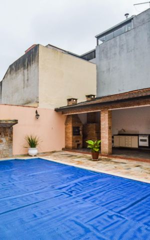 Casa para alugar com 400m², 5 quartos e 12 vagasÁrea externa